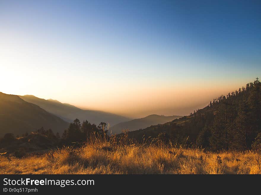 Early morning light at the top of Poon Hill, overlooking the full Annapurna Mountain range. Early morning light at the top of Poon Hill, overlooking the full Annapurna Mountain range