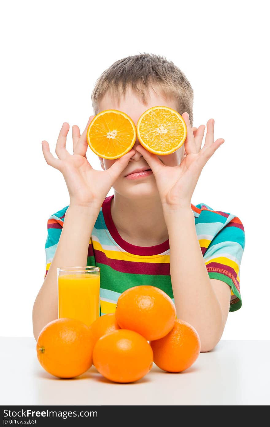 Humorous Photo Of A Boy With Oranges And Fresh Juice On A White Background