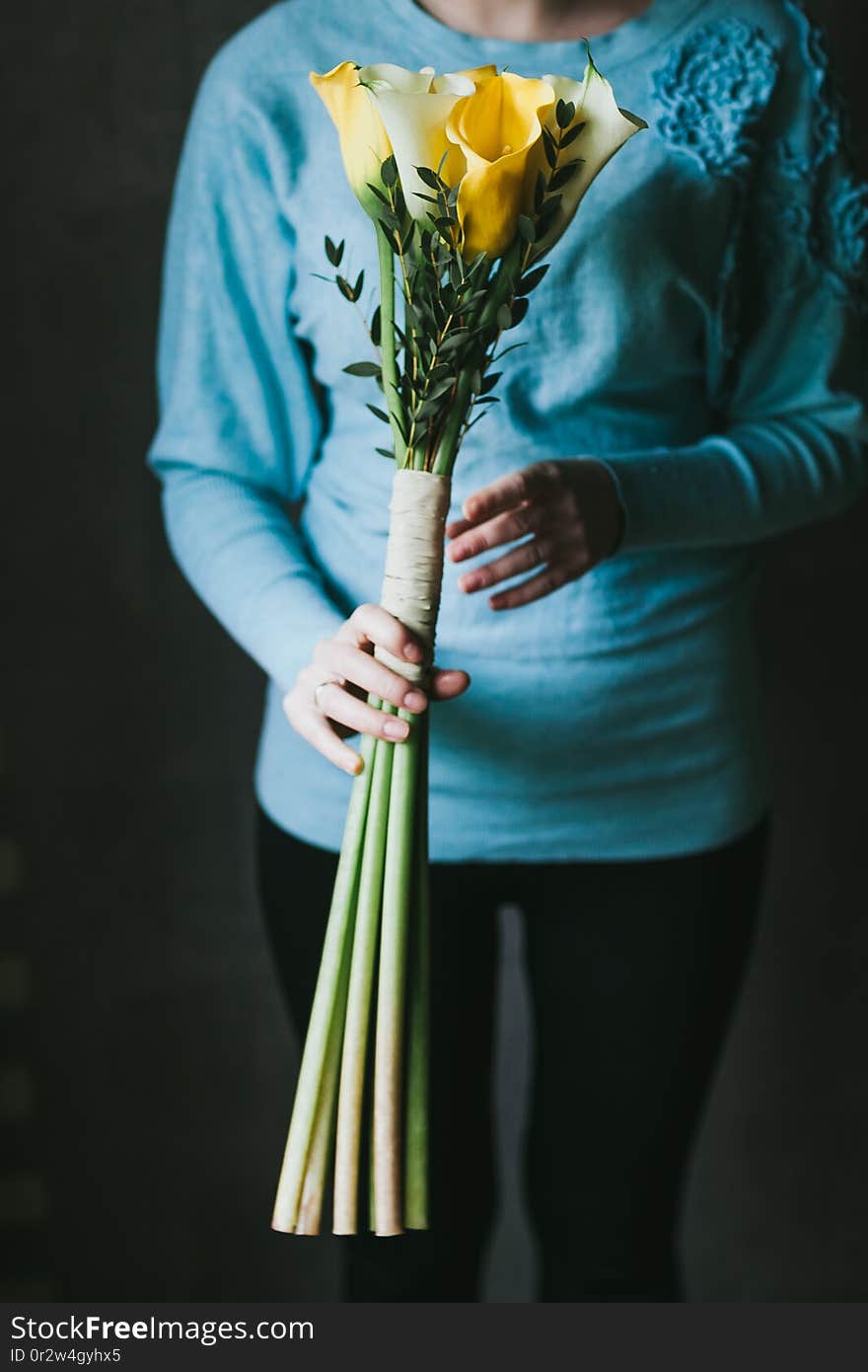 Beautiful bouquet of flowers in the hands of a woman.