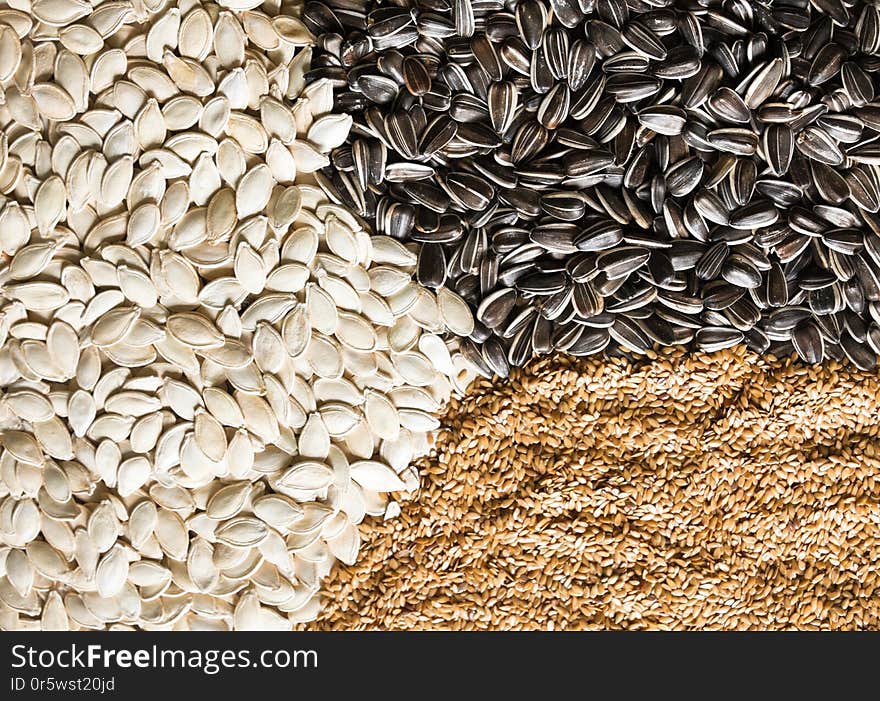 Sesame, sunflower and pumpkin seeds. Healthy eating. Food background