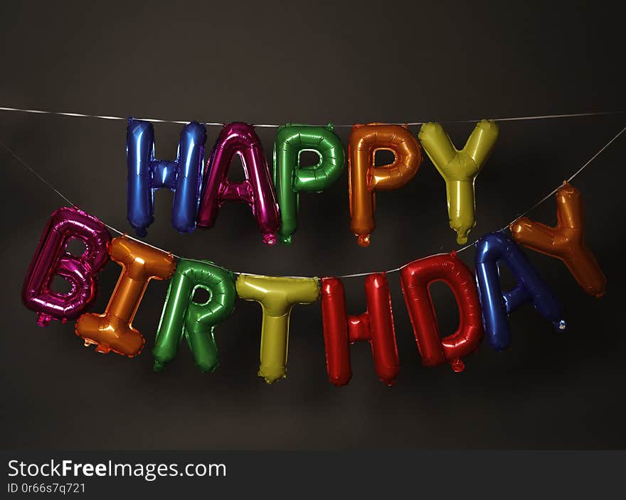 Phrase HAPPY BIRTHDAY made of colorful balloon letters