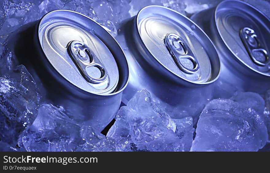 Aluminum can of soda in the ice