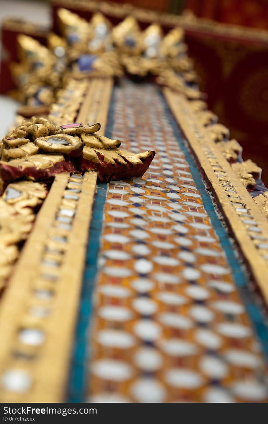 Close up of decoration details from the Emerald Buddha temple in Bangkok with copy space