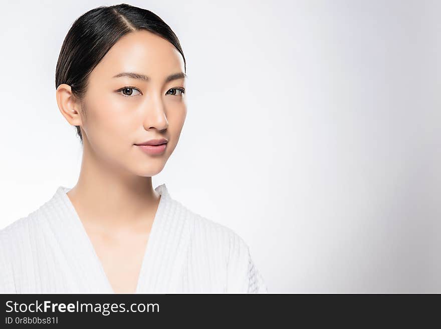 Beautiful Young Asian Woman with Clean Fresh Skin. Face care, Facial treatment, Cosmetology, beauty and spa