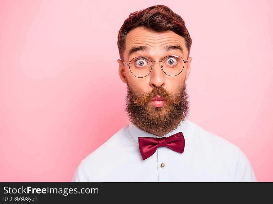 Closeup photo of humorous clever person wearing maroon accessories, having strange facial expression  pastel background