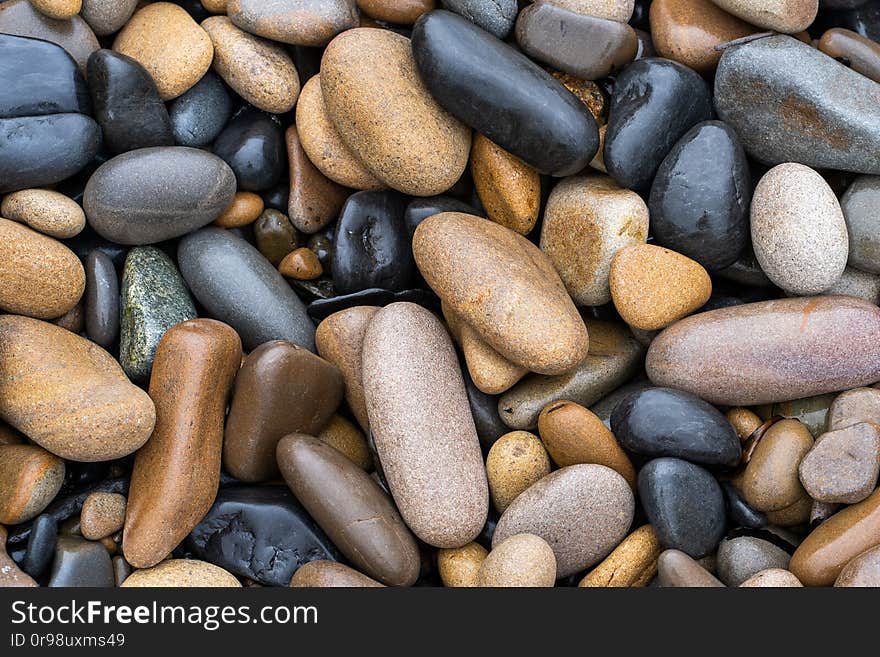 Natural background photo. Image of wet big sea pebbles