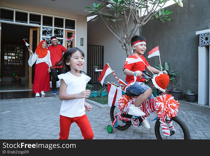 Children indonesia independence day with decorated bicycle