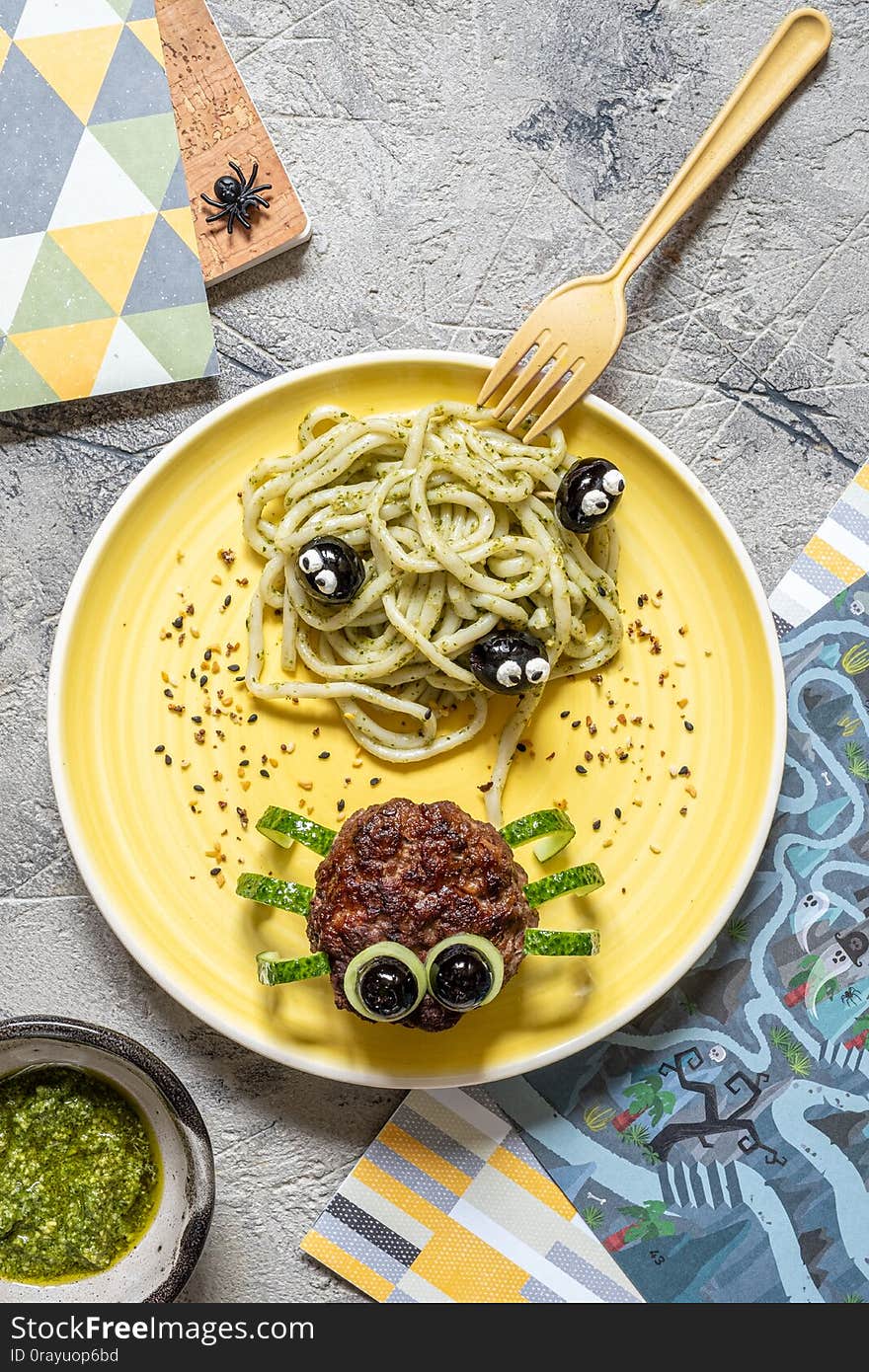 Cutlet look like a spider with pesto pasta. Cutlet look like a spider with pesto pasta