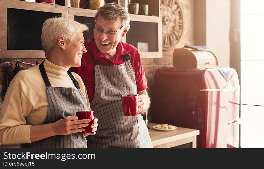 Mature Couple In Love Start New Day With Fresh Coffee At Kitchen