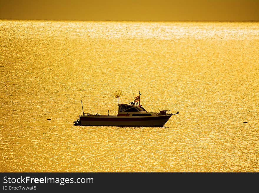 Small fishing boats in  the sea sea in Twilight time .