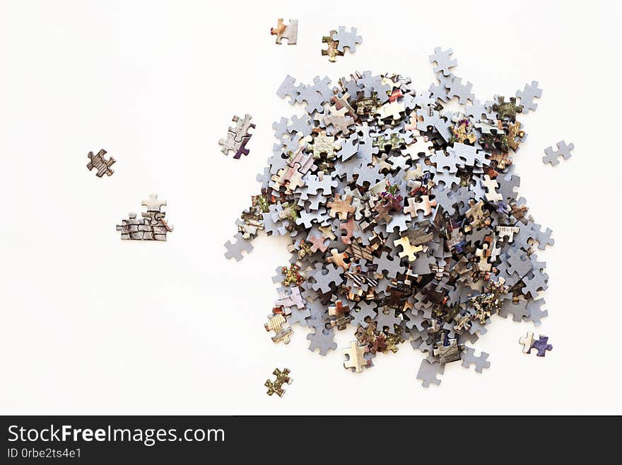 Unfinished Color Puzzle Pieces On White Background. Business Concept