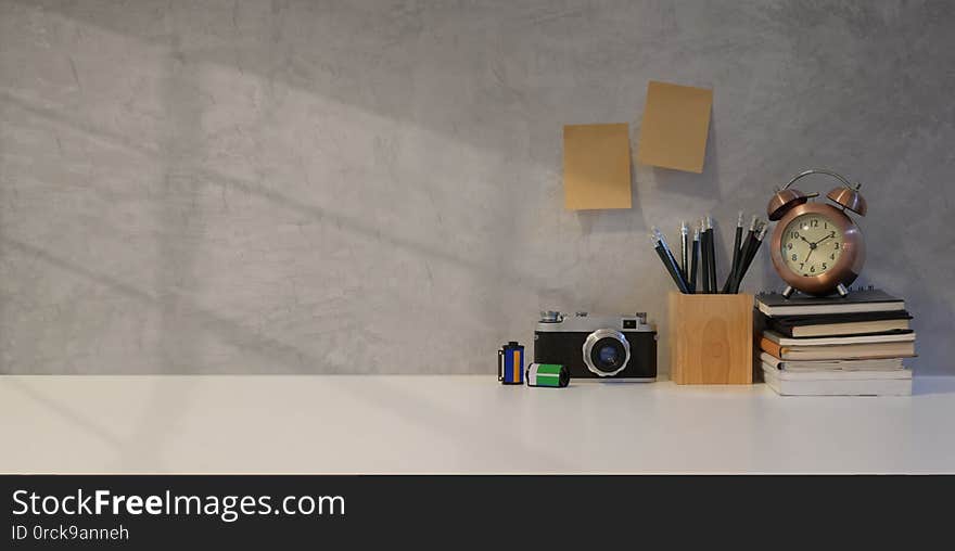 Simple photographer workplace with vintage camera