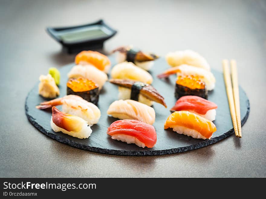 Nigiri sushi set with salmon tuna shrimp prawn eel shell and other sashimi