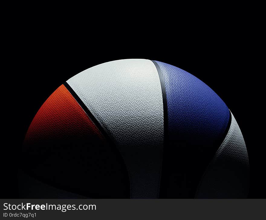 Front view of red white and blue USA colored single basketball sitting on black background. Light shining directly on basketball. dramatic lighting. Front view of red white and blue USA colored single basketball sitting on black background. Light shining directly on basketball. dramatic lighting