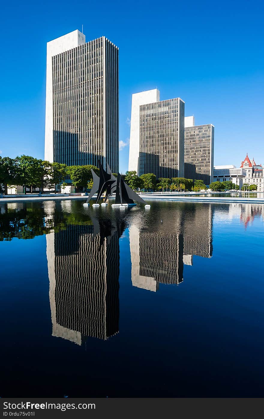 View of several modern office buildings at the Governor Nelson A. Rockefeller Empire State Plaza in Albany, New York, USA. View of several modern office buildings at the Governor Nelson A. Rockefeller Empire State Plaza in Albany, New York, USA.