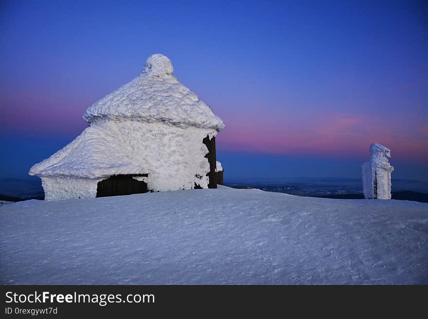 Winter sunset over the Sniezka mount in the Giant Mountains, Karkonosze, Poland