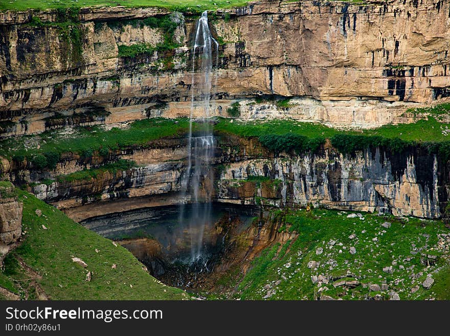 Mountain waterfall landscape in summer Sunny day