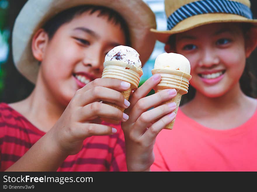 Boys And Girls Carrying Ice Cream