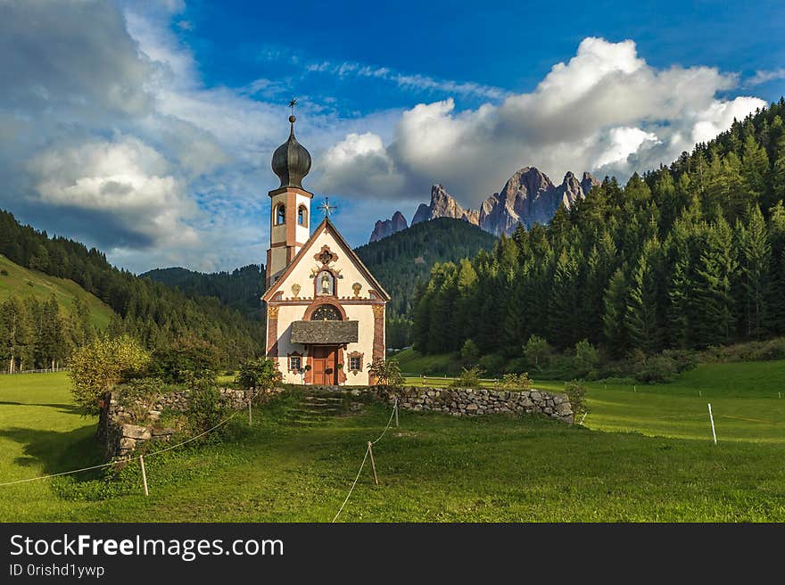 St. John church in front of the Odle mountains, Funes Valley, Dolomites, Italy