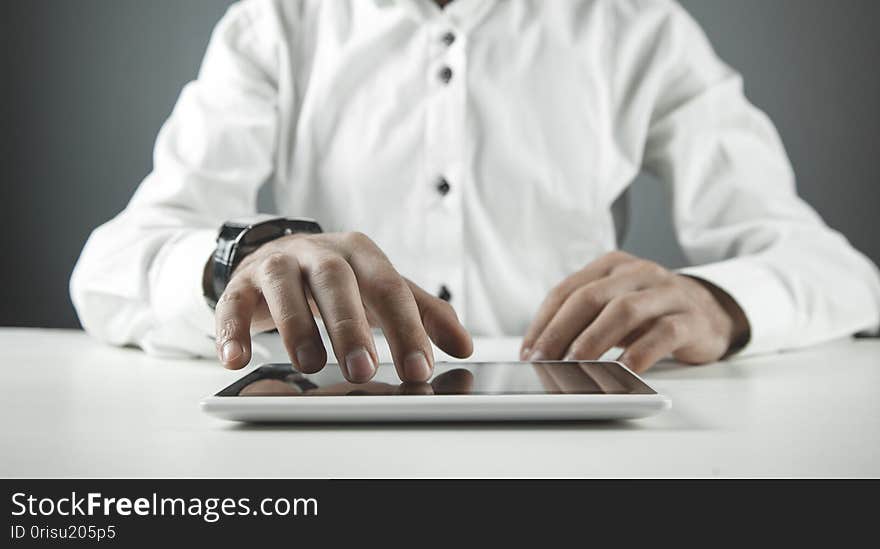 Man using digital tablet. Technology