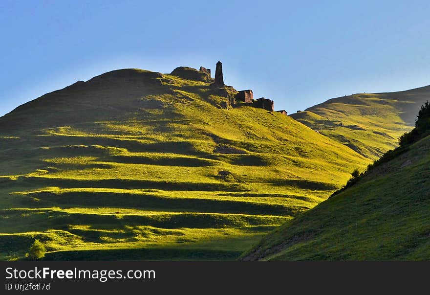 Trek from Omalo to Shatili through Atsunta Pass, Georgia. Beautiful old city, fortress, green hills.