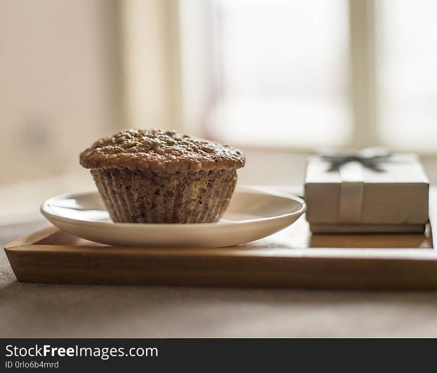 Close up muffin in colourfull cups on the table