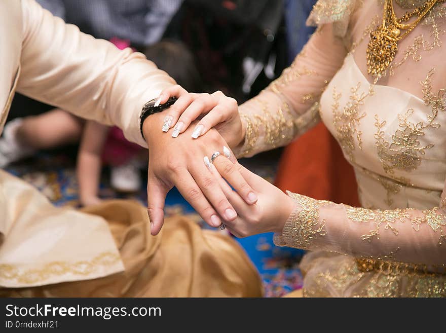 Wedding ring,groom and bride hand in wedding ceremony 1