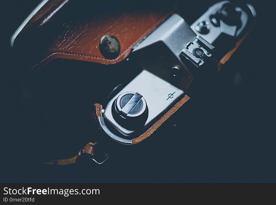 Vintage Camera In A Leather Case. View From Above. Soft Focus.