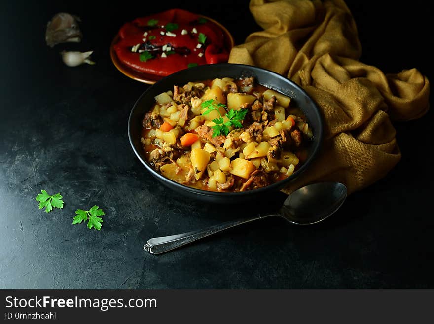 Lamb Stew with Potatoes - in a classic black bowl