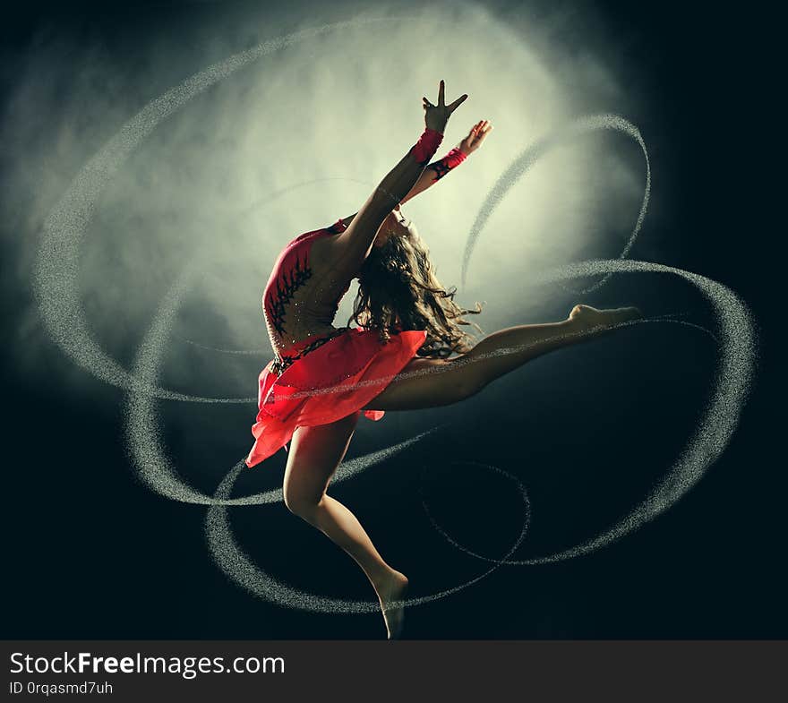 Young beautiful dancer gymnastics jumping in studio over black background, action, active, agility, art, artist, attractive, balance, behavior, blue, caucasian, cheerful, classical, contemporary, dancing, elegance, fashion, female, fitness, girl, grace, grey, indoor, , motion, moving, music, one, people, performance, performer, person, pose, posing, seductive, sensual, sensuality, sport, sporty, stockings, white, woman
