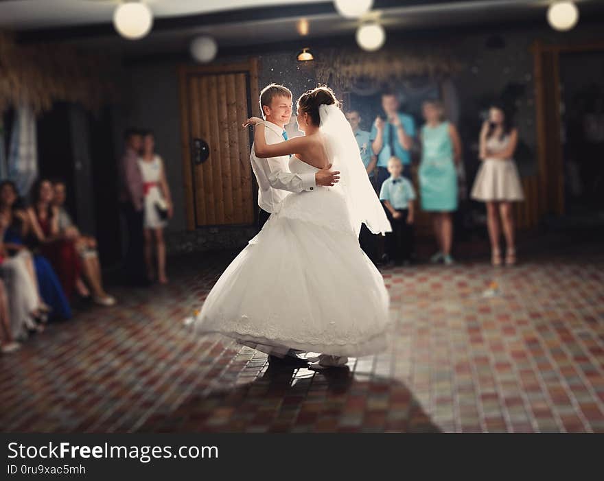 bride and groom dancing