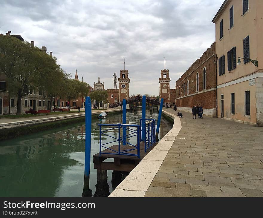 The Venetian Arsenal &#x28;Arsenale di Venezia&#x29; is a complex of former shipyards and armories clustered together in the city of Venice in northern Italy. Owned by the state, the Arsenal was responsible for the bulk of the Venetian republic&#x27;s naval power during the middle part of the second millennium AD. It was one of the earliest large-scale industrial enterprises in history. The Venetian Arsenal &#x28;Arsenale di Venezia&#x29; is a complex of former shipyards and armories clustered together in the city of Venice in northern Italy. Owned by the state, the Arsenal was responsible for the bulk of the Venetian republic&#x27;s naval power during the middle part of the second millennium AD. It was one of the earliest large-scale industrial enterprises in history.