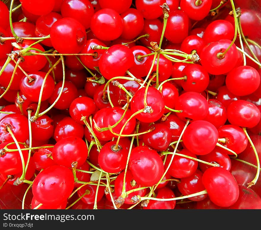 Pile of cherries fresh fruit background texture. Pile of cherries fresh fruit background texture