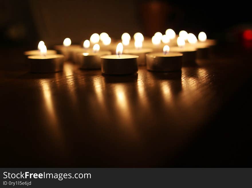 Some nice reflection of tiny flames off the wood of my writing desk. Some nice reflection of tiny flames off the wood of my writing desk.