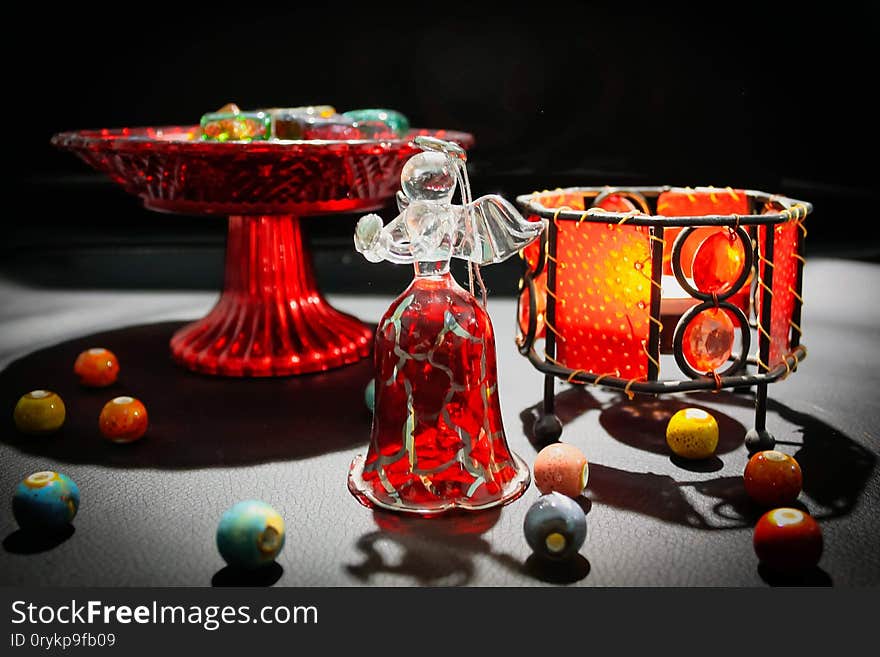 Christmas candles, bowl with sweets and bell