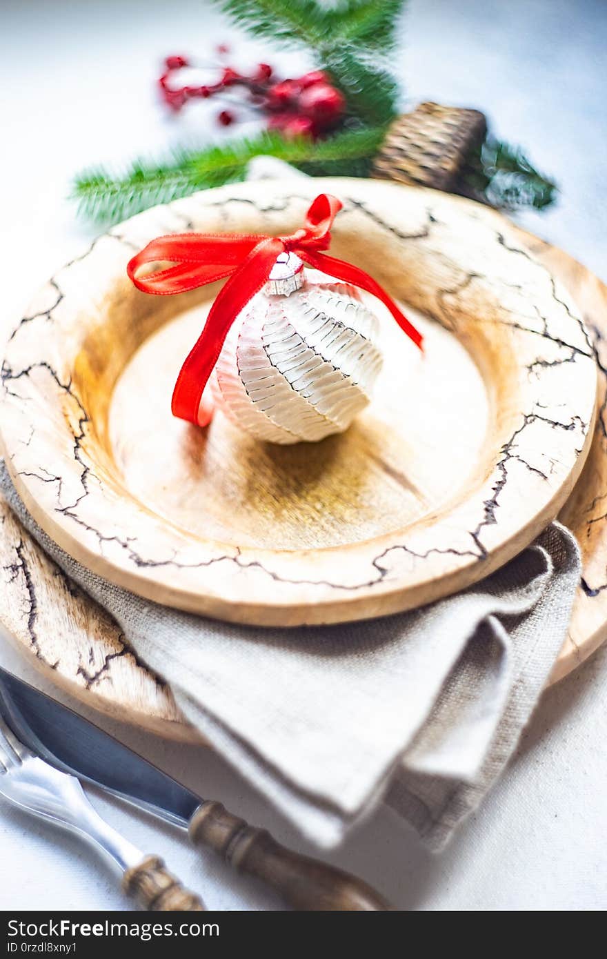 Table setting for festive holiday Christmas dinner on grey background with copy space. Table setting for festive holiday Christmas dinner on grey background with copy space