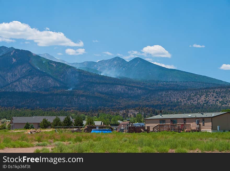 A week after the Schultz Fire began, the wildfire is mostly contained. Clear skies and little smoke provided excellent visibility of the damage to the eastern face of the San Francisco Peaks.