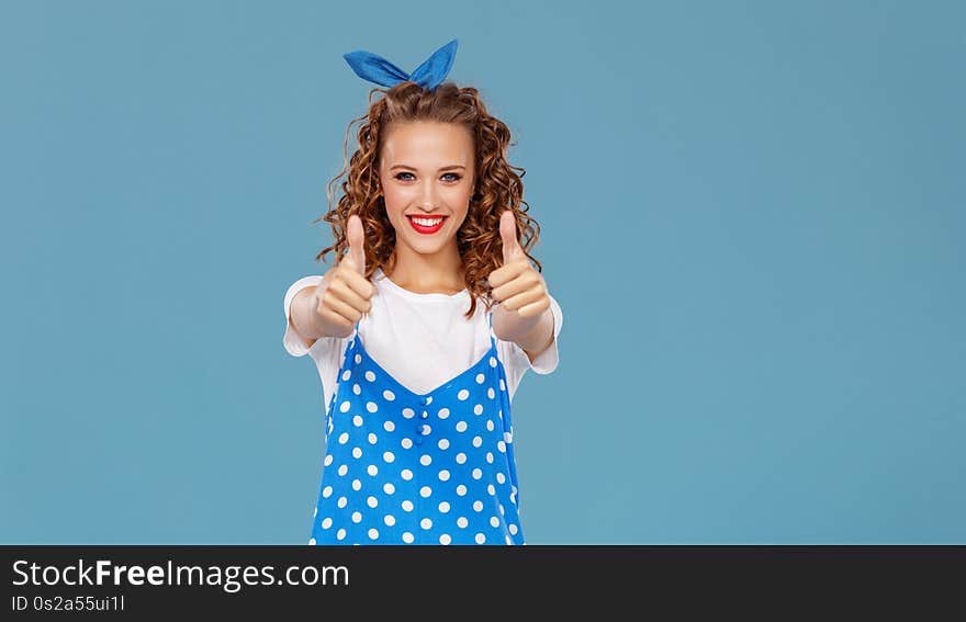 Beautiful Funny Girl On Colored Blue Background