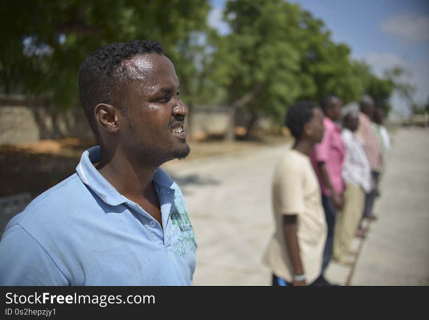 Recruits in Mogadishu&#x27;s new Fire Department are given training by members of the AMISOM forces on January 15, 2013. After having fallen apart during the more than two decades of civil war in Somalia, Mogadishu&#x27;s Fire Department is once again planning to resume its services in the country&#x27;s capital. The fire department will be equipped with three fire engines, which have been donated to the country from the United Kingdom by Alqra Aid and Angloco Limited. AU-UN IST PHOTO / TOBIN JONES. Recruits in Mogadishu&#x27;s new Fire Department are given training by members of the AMISOM forces on January 15, 2013. After having fallen apart during the more than two decades of civil war in Somalia, Mogadishu&#x27;s Fire Department is once again planning to resume its services in the country&#x27;s capital. The fire department will be equipped with three fire engines, which have been donated to the country from the United Kingdom by Alqra Aid and Angloco Limited. AU-UN IST PHOTO / TOBIN JONES.