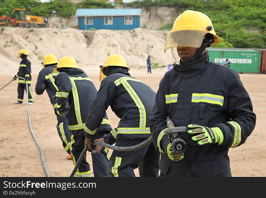 Somali firemen demonstrate their newly learned skills during an excercise attended by the Mayor of Mogadishu, Mohamed Nur, and AMISOM&#x27;s Contingent Commander, Brigadier General Michael Ondoga, in Mogadishu on July 6. AU UN IST PHOTO / ABDI IYE. Somali firemen demonstrate their newly learned skills during an excercise attended by the Mayor of Mogadishu, Mohamed Nur, and AMISOM&#x27;s Contingent Commander, Brigadier General Michael Ondoga, in Mogadishu on July 6. AU UN IST PHOTO / ABDI IYE