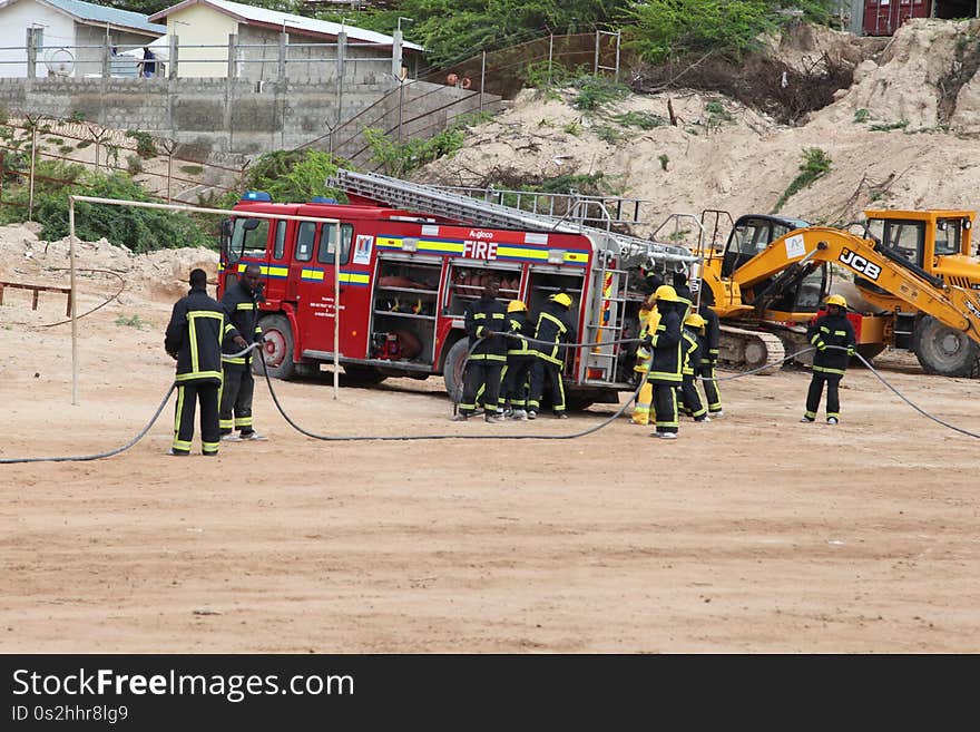 Somali firemen demonstrate their newly learned skills during an excercise attended by the Mayor of Mogadishu, Mohamed Nur, and AMISOM&#x27;s Contingent Commander, Brigadier General Michael Ondoga, in Mogadishu on July 6. AU UN IST PHOTO / ABDI IYE. Somali firemen demonstrate their newly learned skills during an excercise attended by the Mayor of Mogadishu, Mohamed Nur, and AMISOM&#x27;s Contingent Commander, Brigadier General Michael Ondoga, in Mogadishu on July 6. AU UN IST PHOTO / ABDI IYE