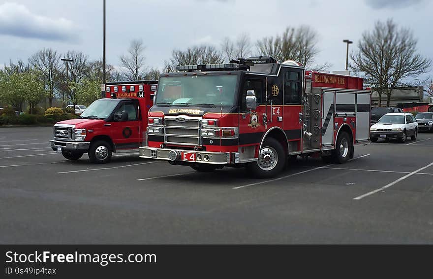This is Bellingham Fire Engine 4 parked alongside the new Ambulance 4 &#x28;belonging to Station 4&#x29;. This is Bellingham Fire Engine 4 parked alongside the new Ambulance 4 &#x28;belonging to Station 4&#x29;.