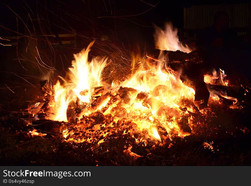 bonfire in backyard at night