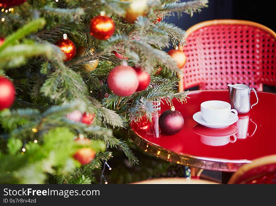 Outdoor Parisian Cafe With Beautiful Christmas Tree