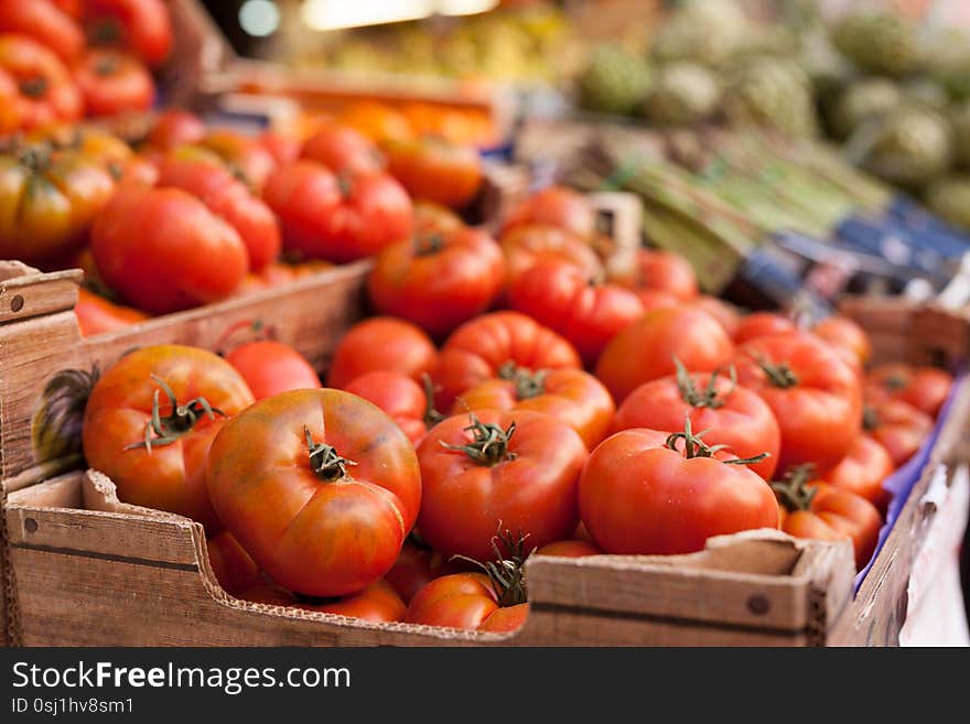 Lots Of Tomatoes On A Branch On Counter