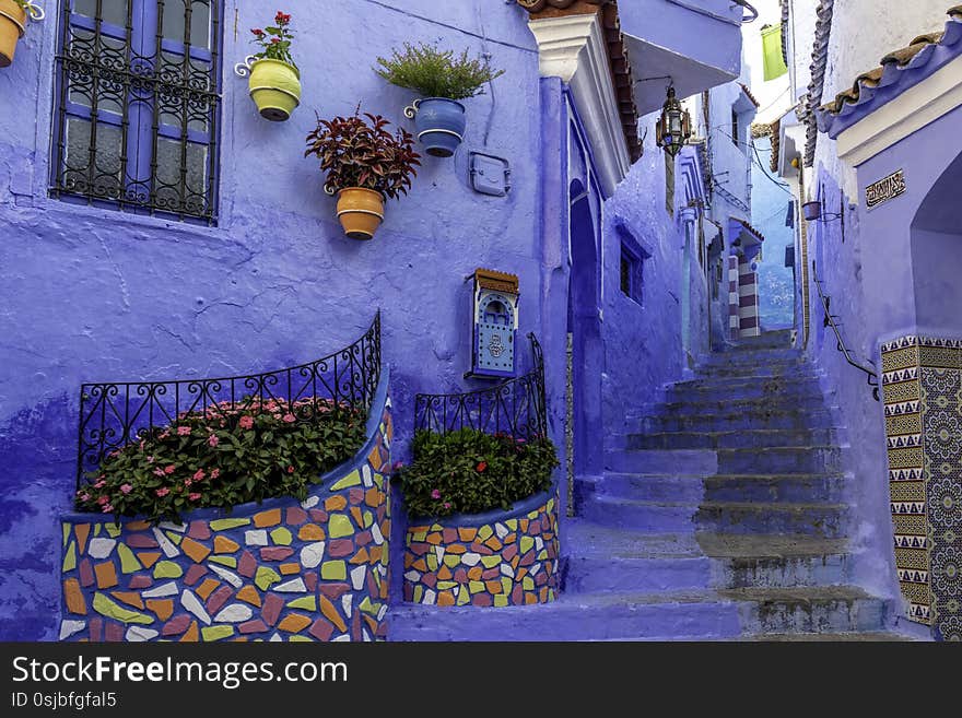 Stunning blue streets and tiles of Chefchaouen Morocco with morning light