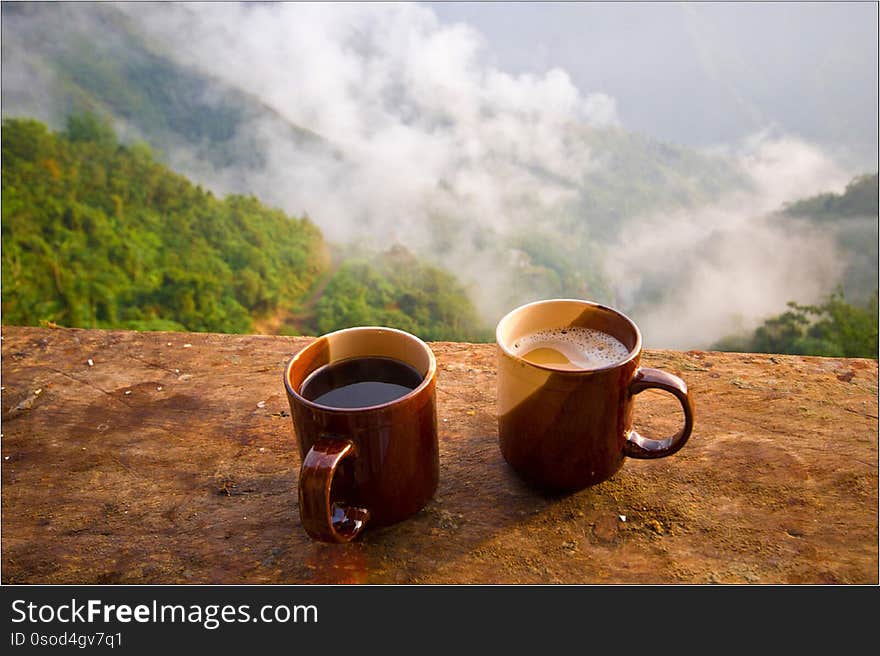 cup of coffee on background of sky and clouds