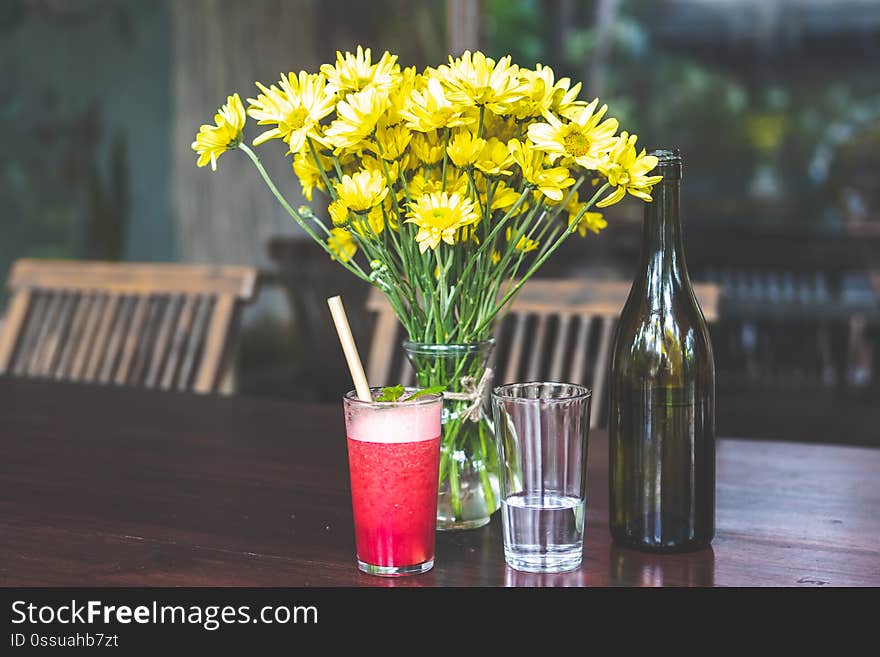 Raspberry lemonade on a wooden table. Iced summer drink. Bali.