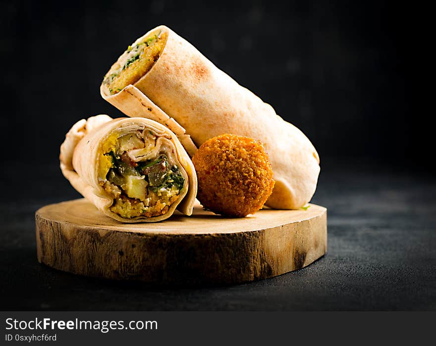 Falafel, Sandwich Falafel On A Black Background.