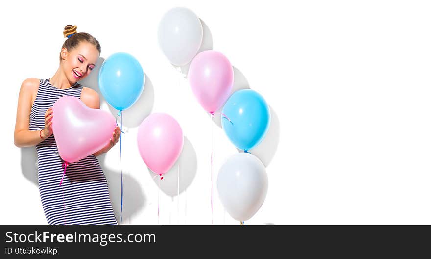 Beauty girl with colorful air balloons laughing over white background. Beautiful Happy Young woman on birthday holiday party